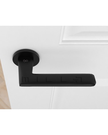 Black door handle Line GIULIA design handle top view mounted on a door