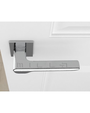 Polished chrome LINE design door handle top view mounted on a door