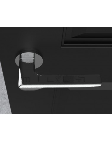 LIGNE polished chrome design door handle top view mounted on a door