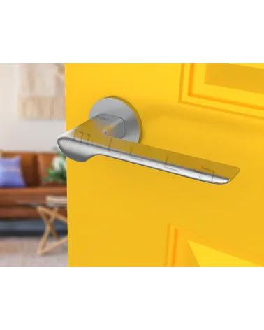 LIGNE modern style design door handle tilted view mounted on a door