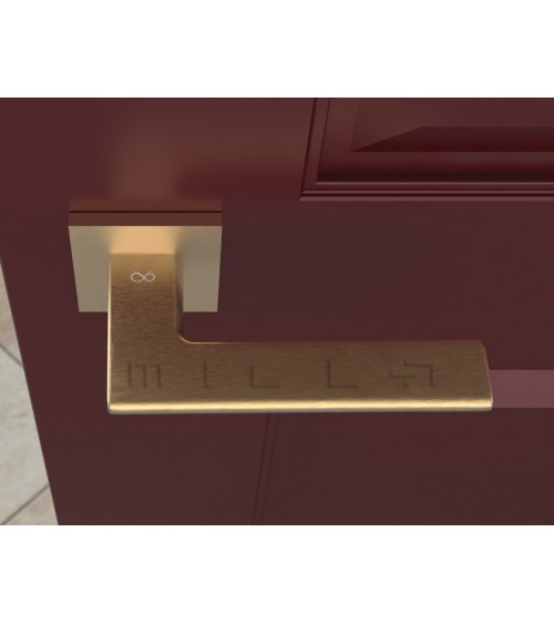 Matt gold Shark door handle - design handle