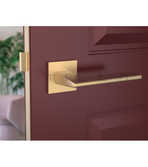 Matt gold Shark door handle - design handle