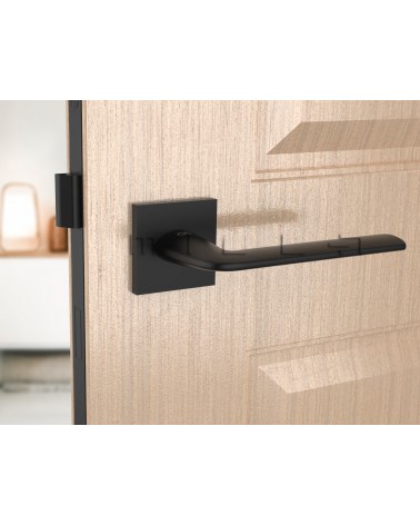 Black STINGER door handle designer handle front view mounted on a door