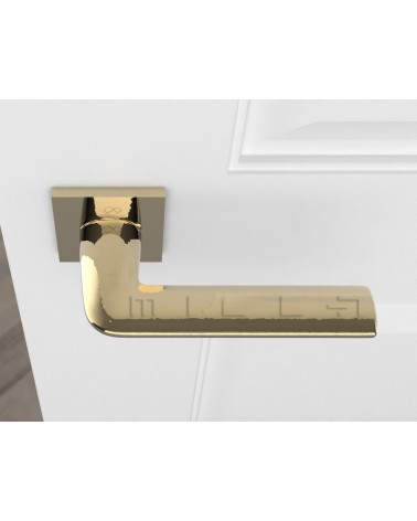 Gold STINGER door handle designer handle top view mounted on a door