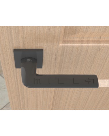 Titanium STINGER door handle designer handle top view mounted on a door