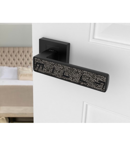 Black GLAMOUR door handle design ironmongery top view mounted on a door