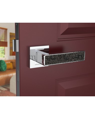 Polished chrome GLAMOUR door handle design ironmongery front view mounted on a door