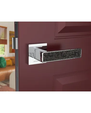 Polished chrome GLAMOUR door handle design ironmongery front view mounted on a door