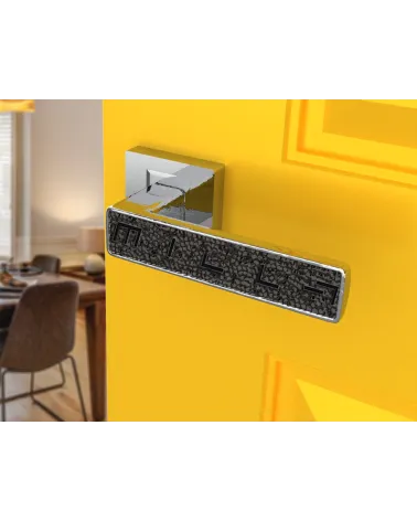 Polished chrome GLAMOUR door handle design ironmongery angled view mounted on a door 1