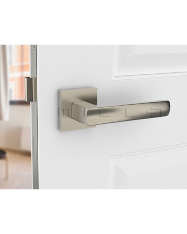 Satin nickel door handle DIUNA designer handle front view mounted on a door