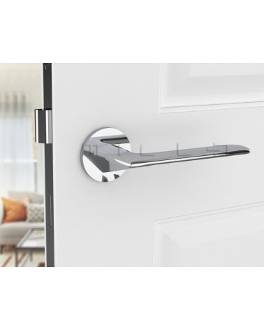 Polished chrome door handle Line GIULIA designer handle front view mounted on a door