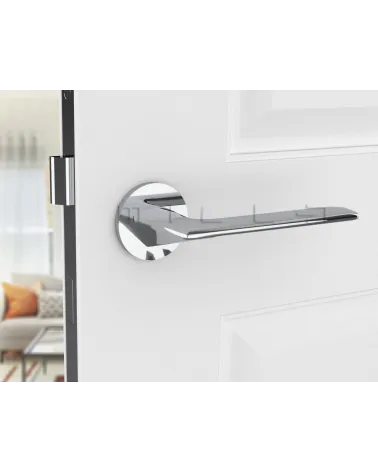 Polished chrome door handle Line GIULIA designer handle front view mounted on a door