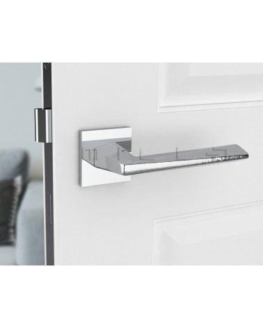 Polished chrome DIAMANT door handle design front view mounted on a door