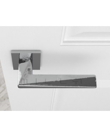 Polished chrome DIAMANT door handle design top view mounted on a door