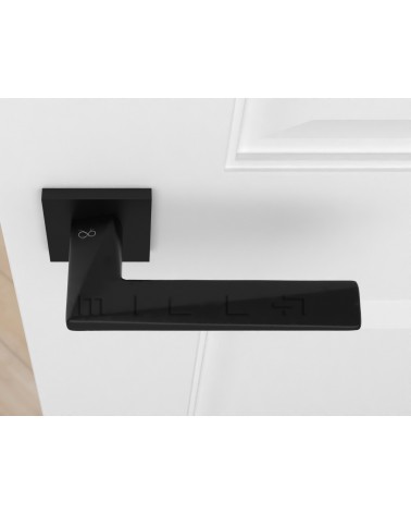 Black DIAMANT door handle design top view mounted on a door