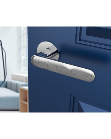 Polished chrome Line Venus door handle designer handle mounted on an ajar door
