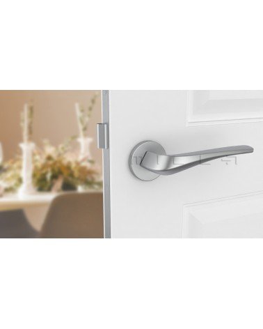 DALIA round plate door handle designer handle colour 4 front view mounted on a door
