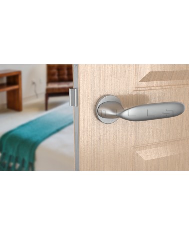 PEONIA round plate door handle design handle colour 2 front view mounted on a door