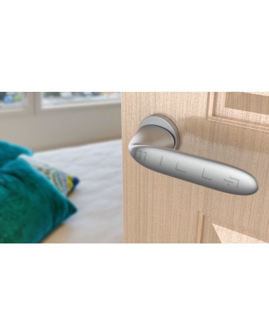 PEONIA round plate door handle design handle colour 2 angled top view mounted on a door