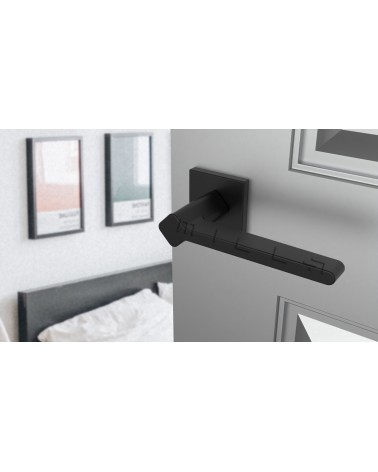 NINFEA square plate door handle designer handle colour 1 angled top view mounted on a door
