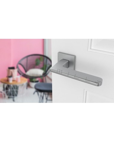 YUKA rectangular backplate door handle design handle colour 2 angled top view mounted on a door