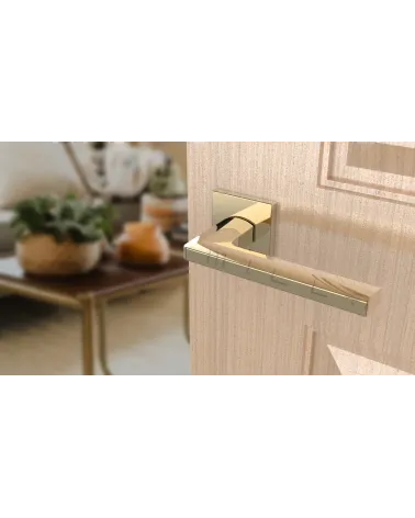PYROLA square plate door handle design hardware angled top view mounted on a door