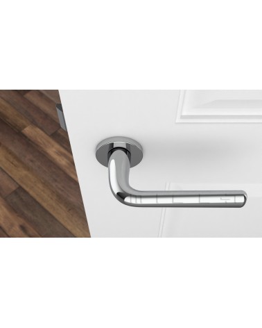 TULIPA round plate door handle designer handle top view mounted on a door