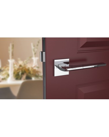 LUNARIA zamak door handle design handle colour 2 front view mounted on a door