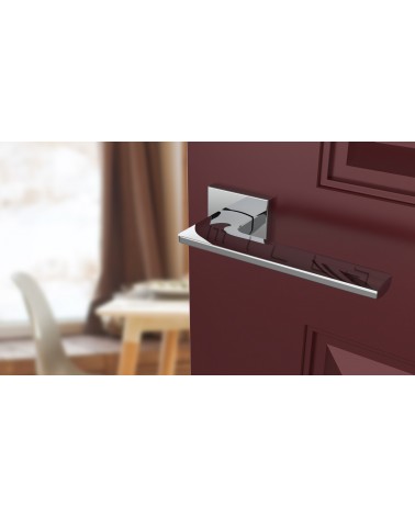 LUNARIA zamak door handle design handle colour 2 angled top view mounted on a door
