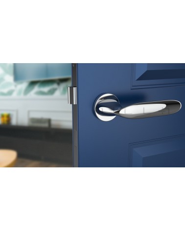 PEONIA zamak door handle design handle colour 1 front view mounted on a door