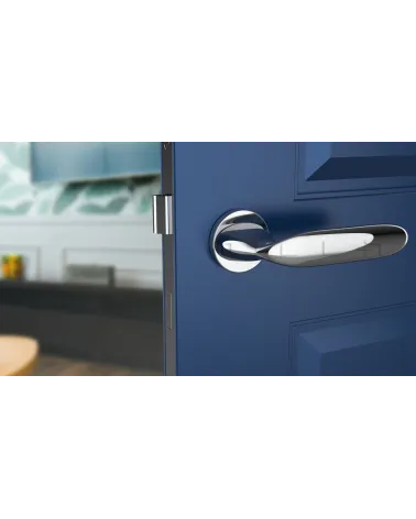 PEONIA zamak door handle design handle colour 1 front view mounted on a door