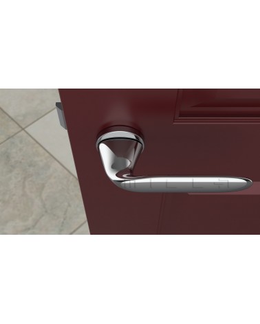 PEONIA zamak door handle design handle colour 1 top view mounted on a door