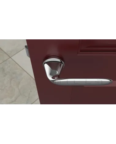 PEONIA zamak door handle design handle colour 1 top view mounted on a door