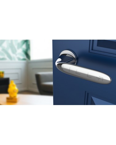 PEONIA zamak door handle design handle colour 1 top angled view mounted on a door