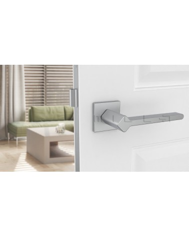 NINFEA zamak door handle designer handle colour 2 front view mounted on a door