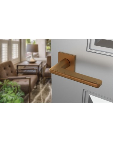 Contemporary SETIA door handle design hardware colour 3 top angled view mounted on a door