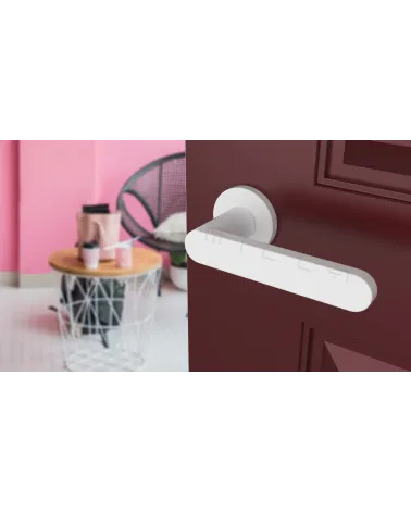ALORA zamak door handle designer handle colour 5 tilted top view mounted on door