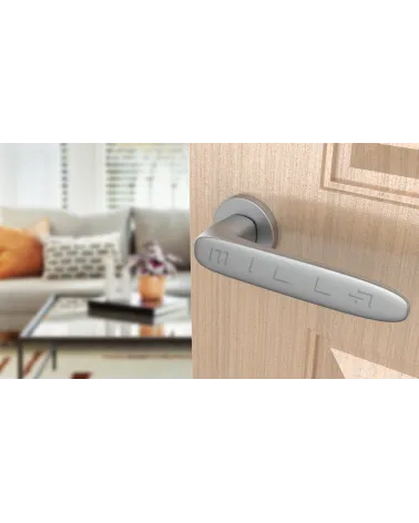 ROSA zamak door handle design handle colour 1 angled top view mounted on a door