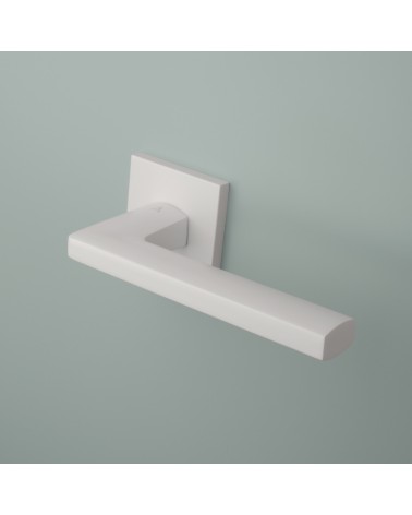 PYROLA zamak door handle design hardware mounted on a door