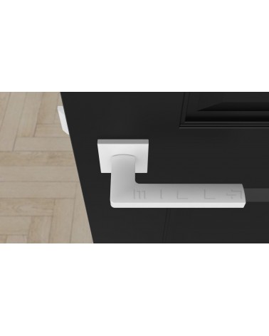 PYROLA zamak door handle design ironmongery top view mounted on a door
