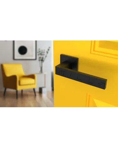SULLA zamak door handle design handle colour 2 angled top view mounted on a door