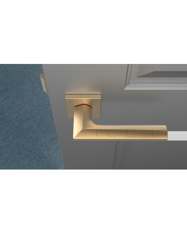 JASMINA zamak door handle design handle colour 3 angled top view mounted on a door