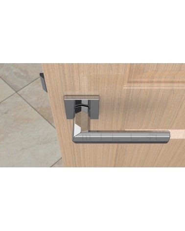 FRESIA zamak door handle design handle colour 1 angled top view mounted on a door