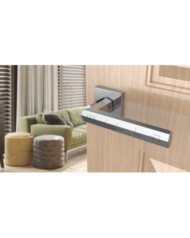 FRESIA zamak door handle design handle colour 2 front view mounted on a door