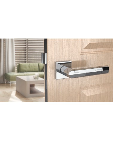 FRESIA zamak door handle design handle colour 2 angled top view mounted on a door