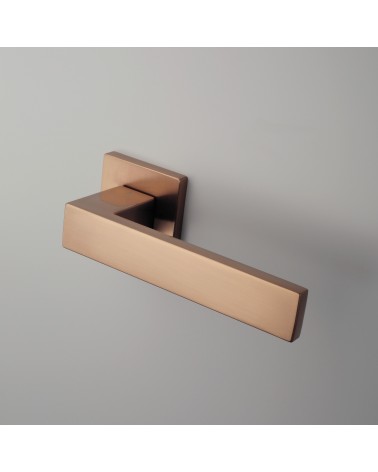 PINA zamak door handle design handle colour 1 mounted on a door