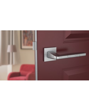 ERBA zamak door handle design handle colour 2 front view mounted on a door