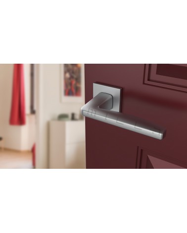 ERBA zamak door handle design handle colour 2 angled top view mounted on a door