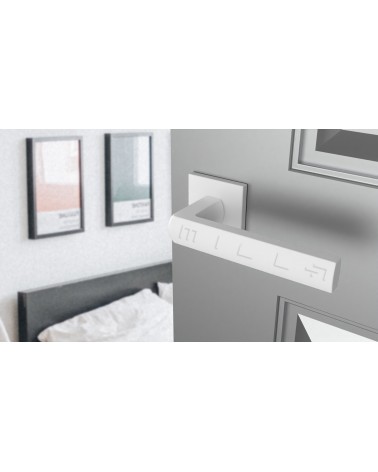 HOSTA zamak door handle design handle top angled view mounted on a door