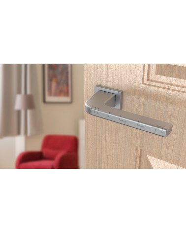 ISMENA zamak door handle design handle angled top view mounted on a door